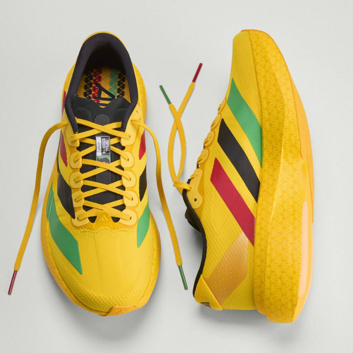 + Bob Marley Adizero Evo SL ‘Bold Gold’