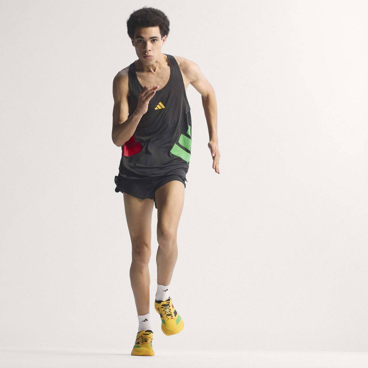 + Bob Marley Adizero Evo SL ‘Bold Gold’