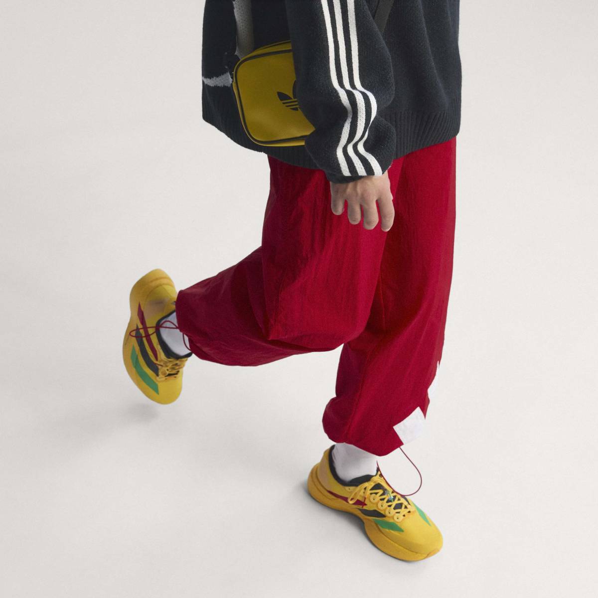 + Bob Marley Adizero Evo SL ‘Bold Gold’