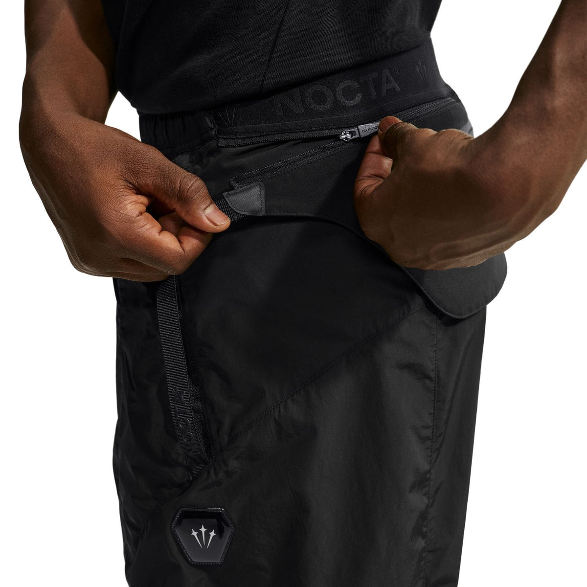 + NOCTA Zombie Cut Track Pants 'Black'