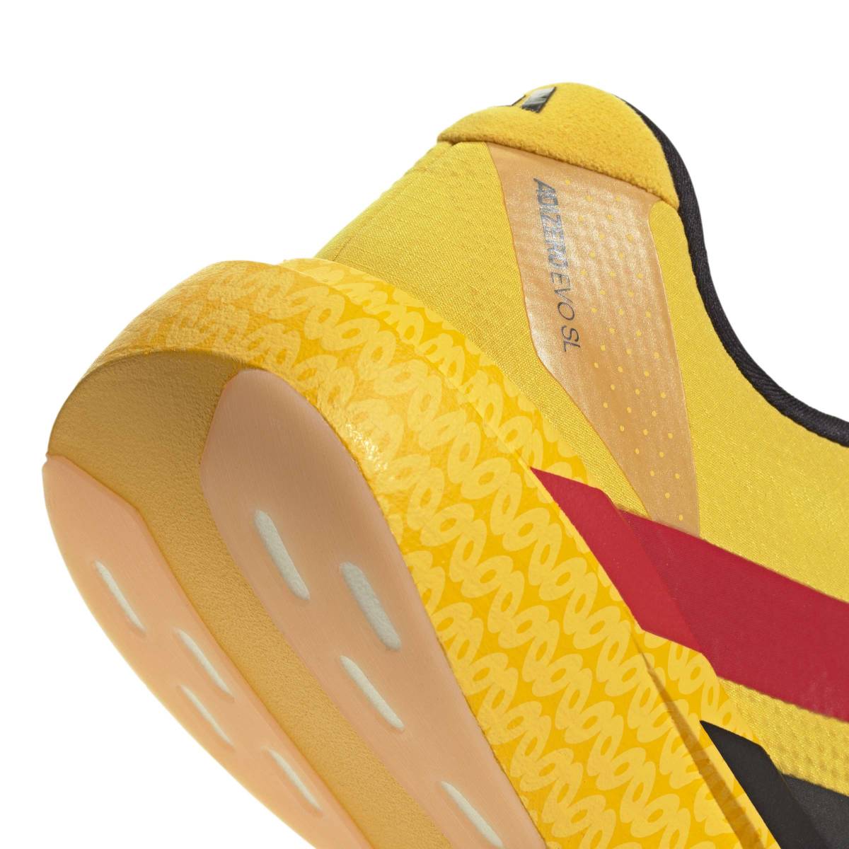 + Bob Marley Adizero Evo SL ‘Bold Gold’