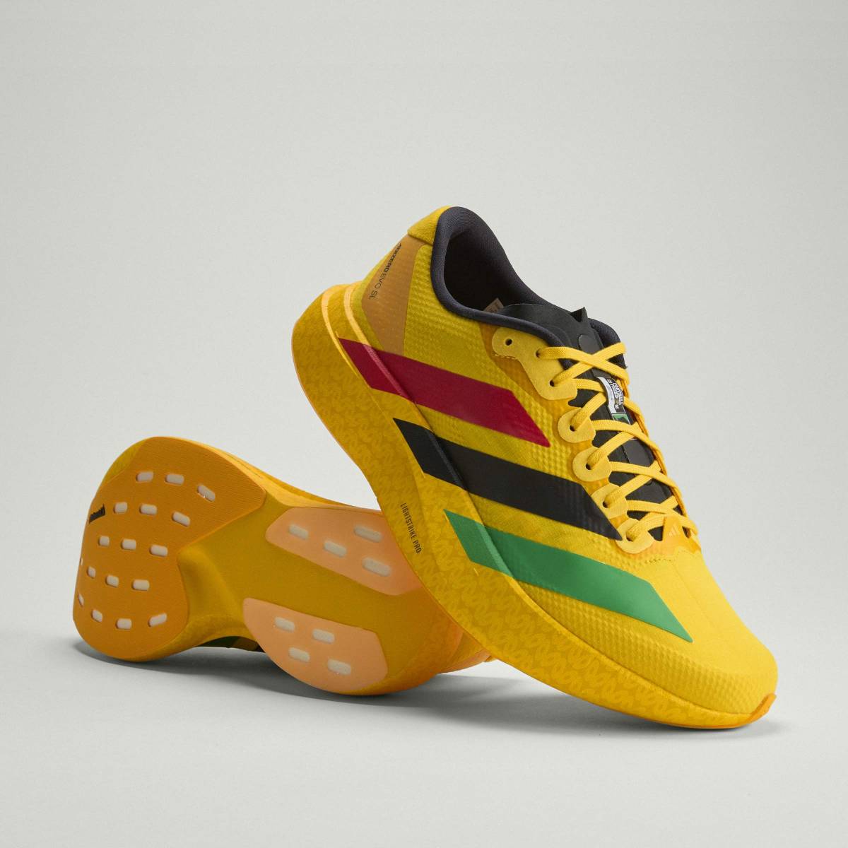 + Bob Marley Adizero Evo SL ‘Bold Gold’
