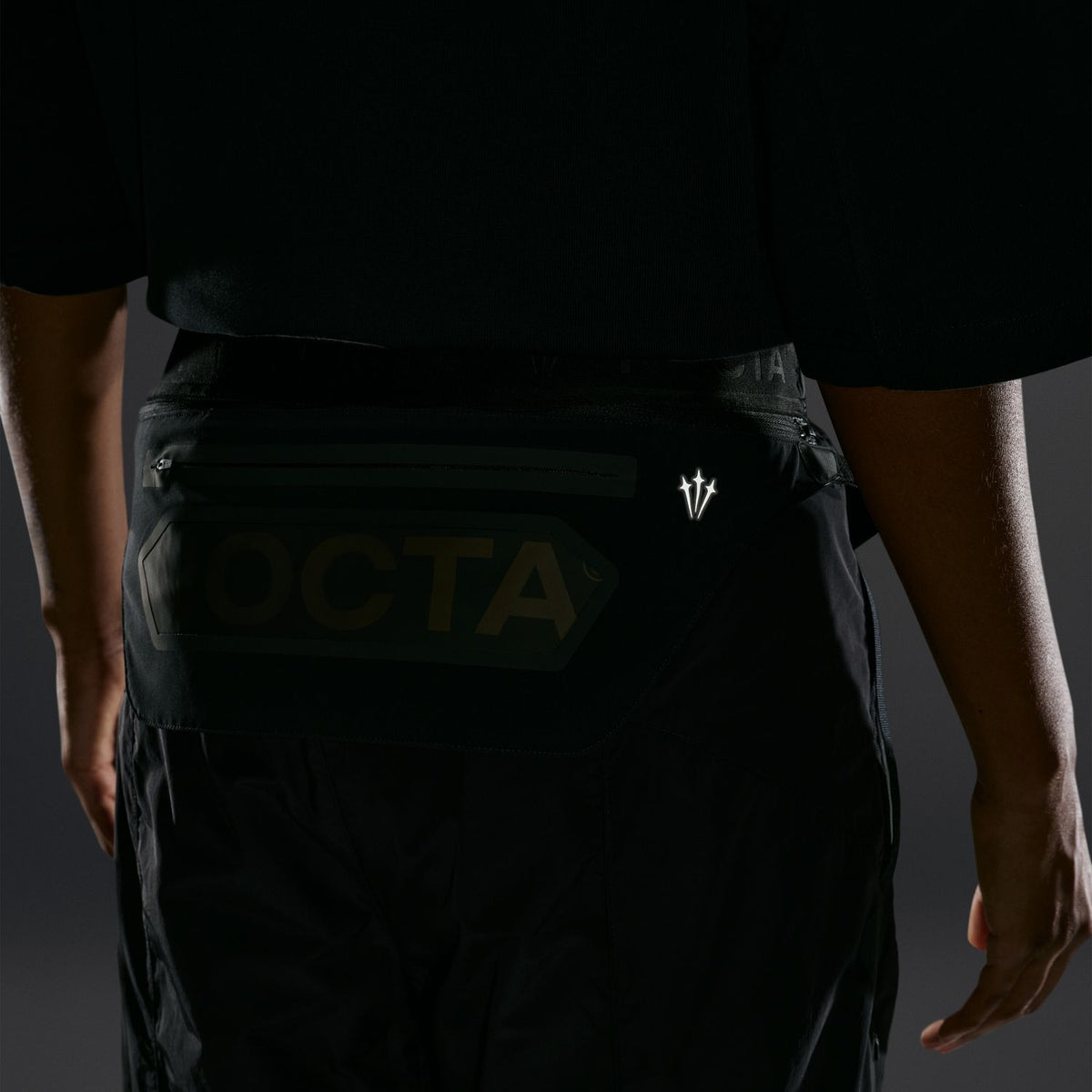 + NOCTA Zombie Cut Track Pants 'Black'