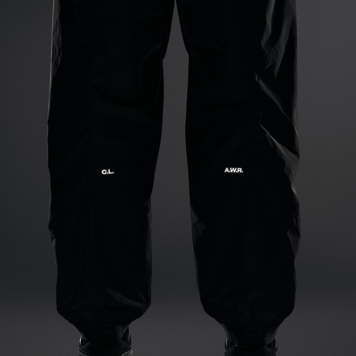 + NOCTA Zombie Cut Track Pants 'Black'