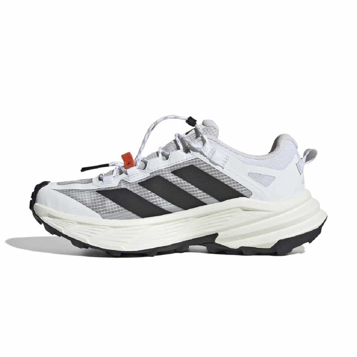 A white and gray Adidas trail running shoe with black three-stripes, a chunky off-white midsole, and a black outsole, shown from a side profile on a white background.