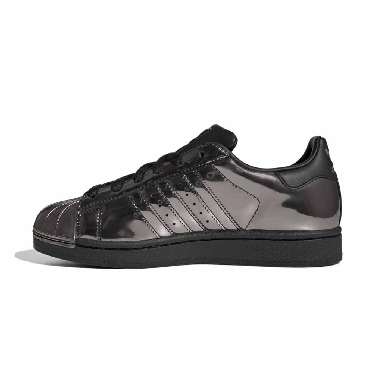 A single Adidas Superstar sneaker in a metallic dark gray and black patent finish, shown from a side profile on a white background.