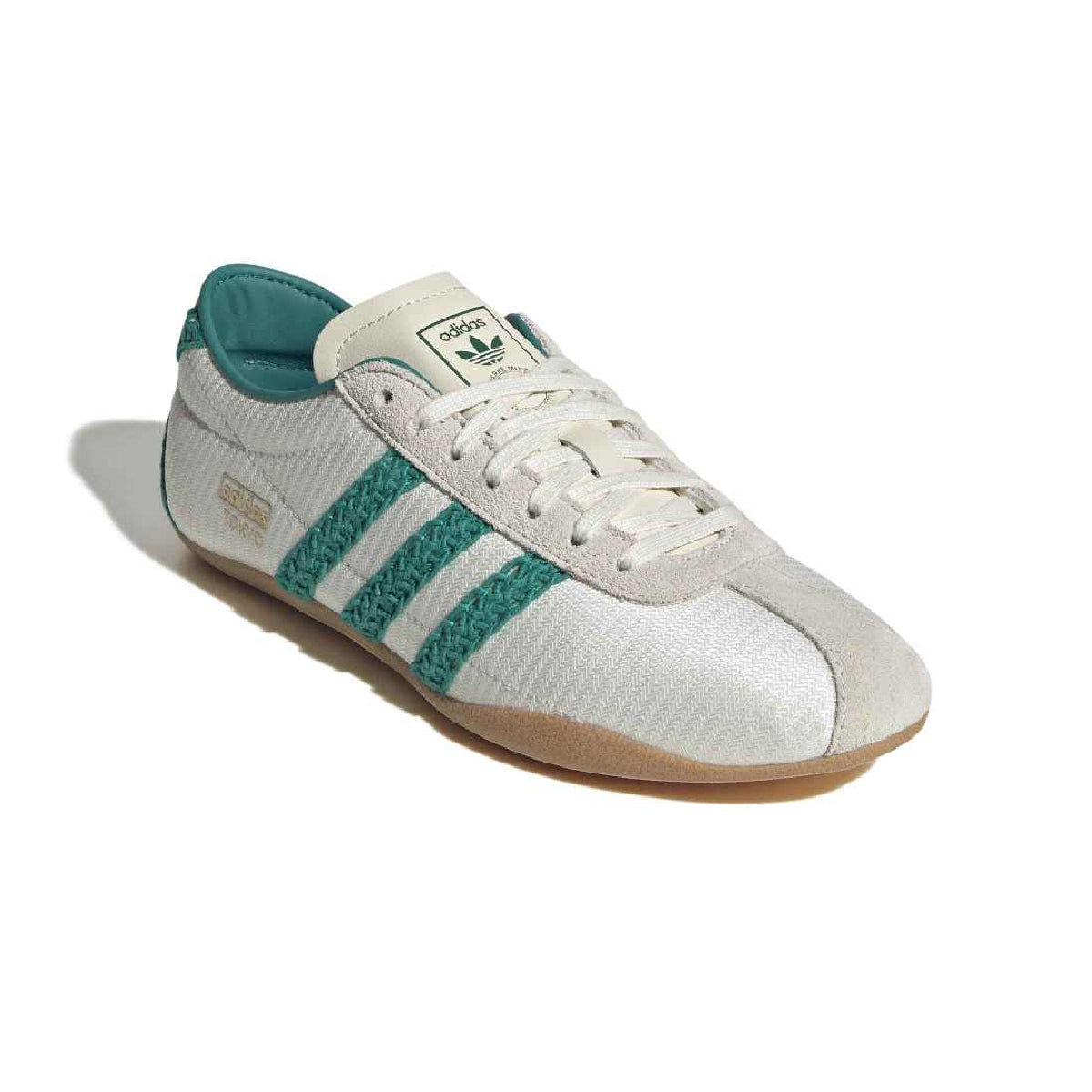 A white Adidas Tokyo sneaker with teal green knit three-stripes, a teal green collar lining, and a gum rubber sole, shown on a white background with a soft shadow.