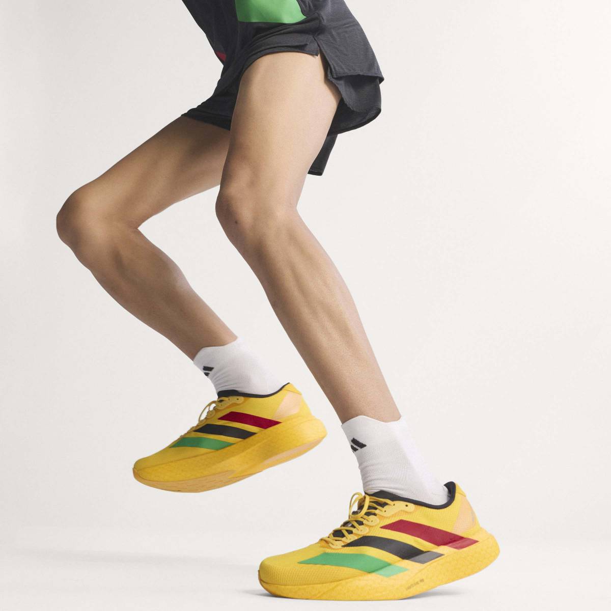 + Bob Marley Adizero Evo SL ‘Bold Gold’