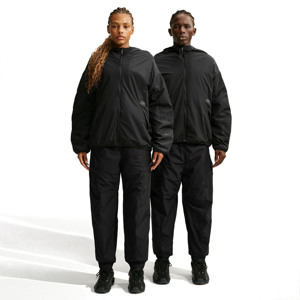 + NOCTA Zombie Cut Track Pants 'Black'