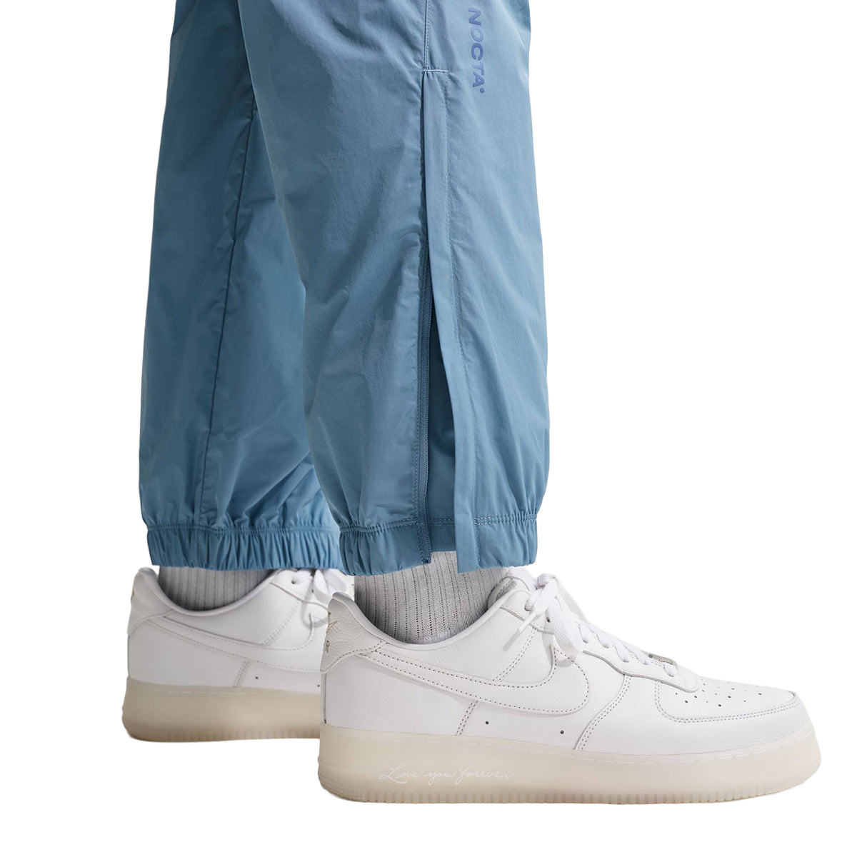 + NOCTA Northstar Nylon Track Pants 'Work Blue'