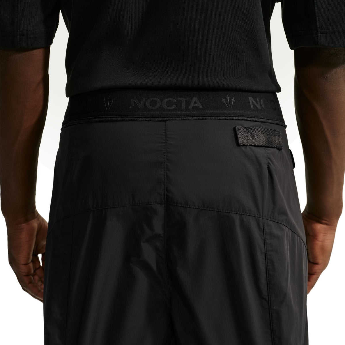 + NOCTA Zombie Cut Track Pants 'Black'