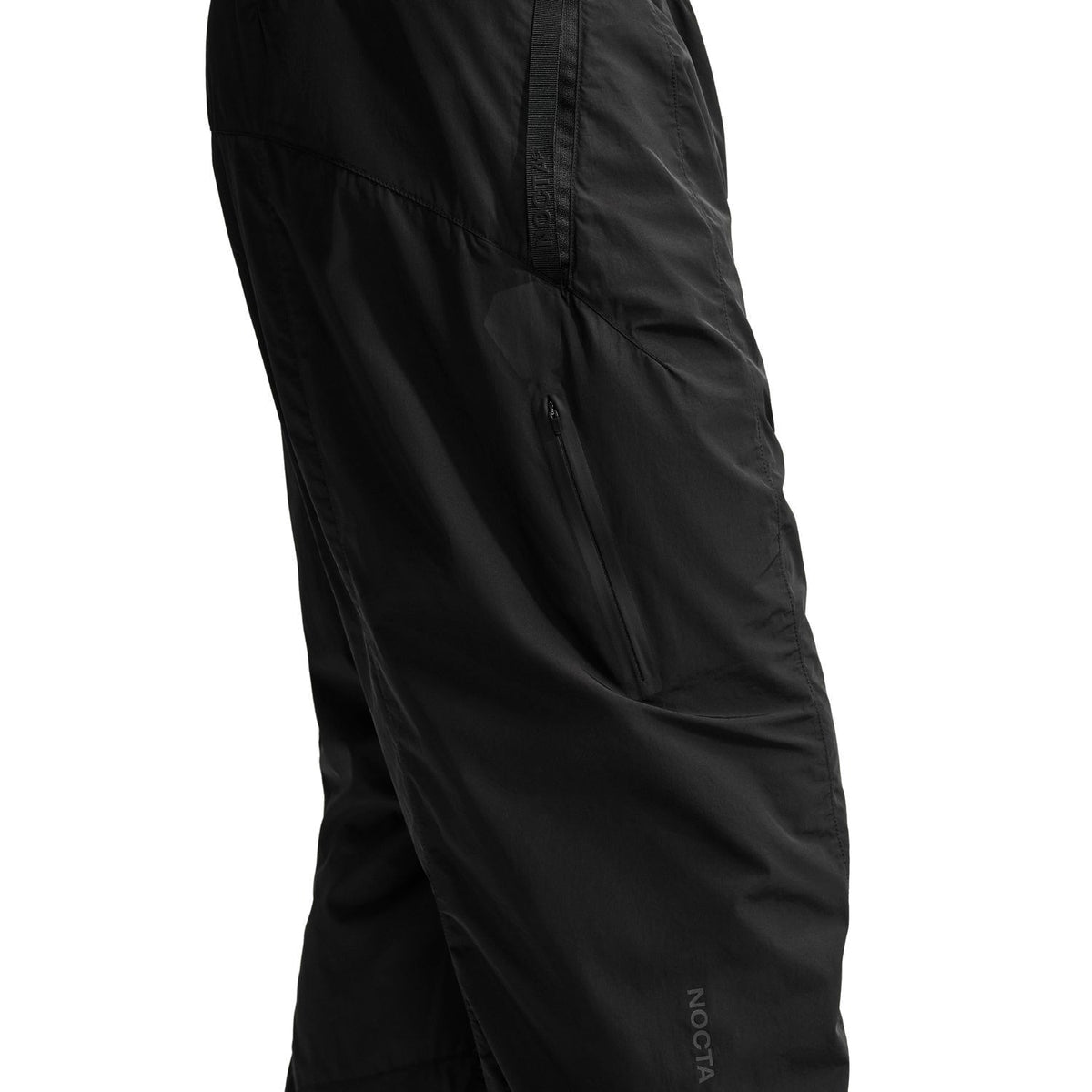 + NOCTA Zombie Cut Track Pants 'Black'