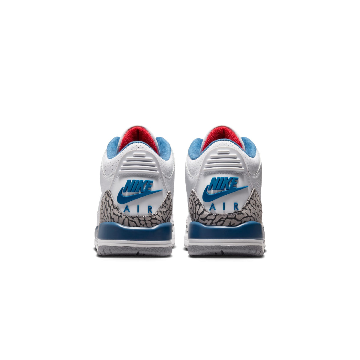 A pair of Nike Air Jordan 3 sneakers shown from the back, featuring a white leather upper, blue Nike Swoosh and Air unitole, a gray elephant print heel, and a red tongue.