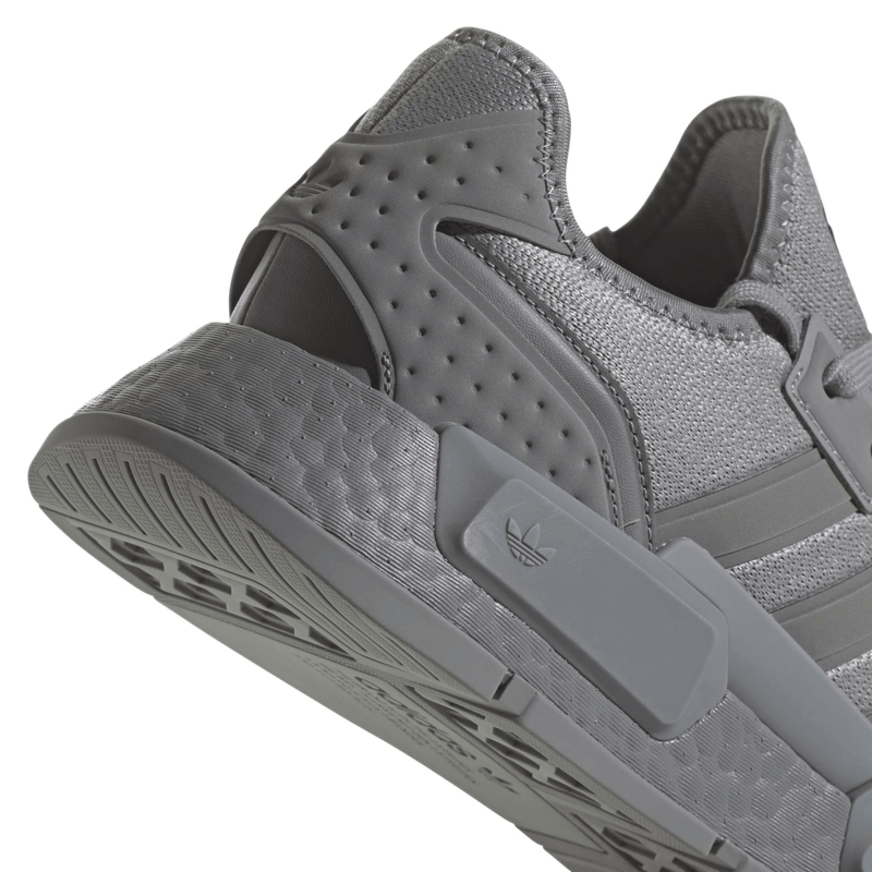 Adidas nmd r1 top nere con strisce oro