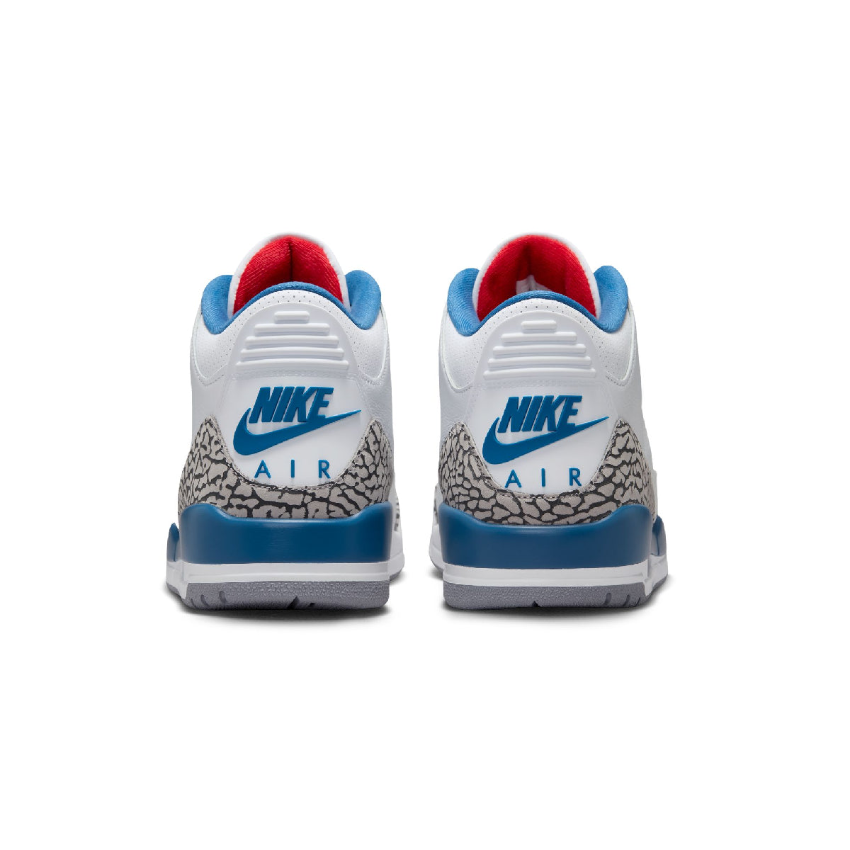 A pair of Nike Air sneakers shown from the back, featuring a white leather upper, blue Nike swooshes and heel accents, a gray elephant print pattern, and a red interior lining, set against a plain white background.