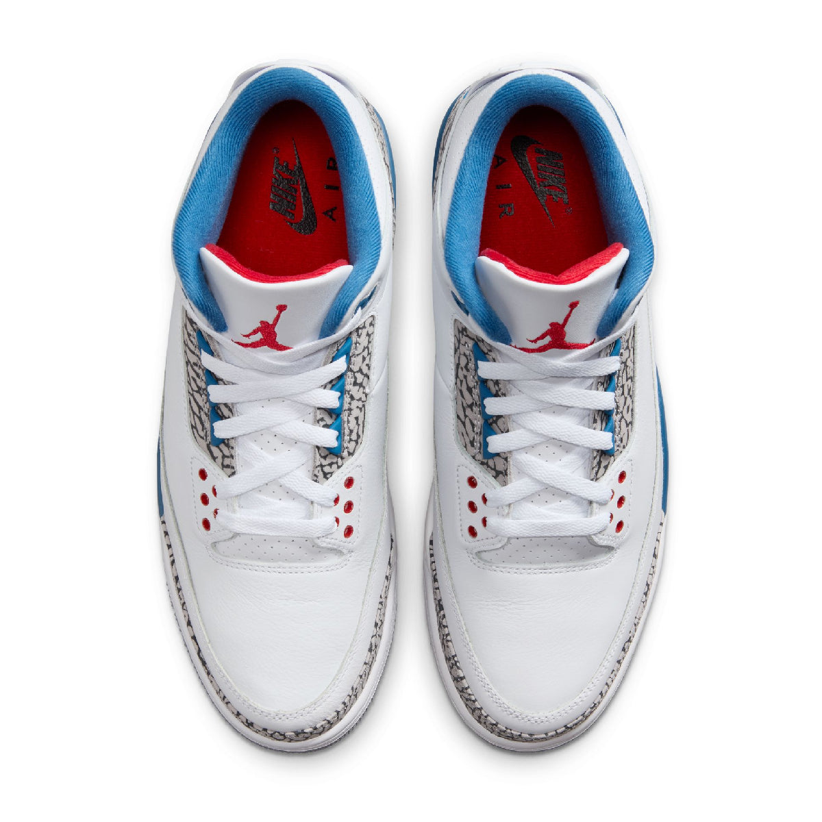 A pair of white high-top sneakers shown from a top-down view on a white background. The shoes feature a white leather upper with gray elephant print overlays, white laces, red accents around the eyelets and tongue, and a bright blue collar lining.