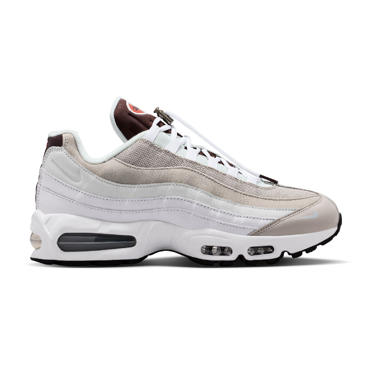A Nike Air Max 95 sneaker in white, beige, and gray, featuring a white and beige mesh upper, white laces, a white midsole with visible air units, and a black outsole.