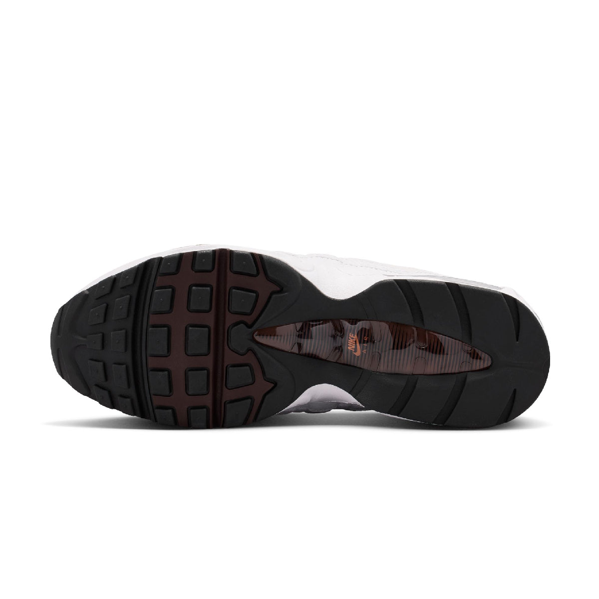 Black sole of a sneaker with Nike branding on a white background