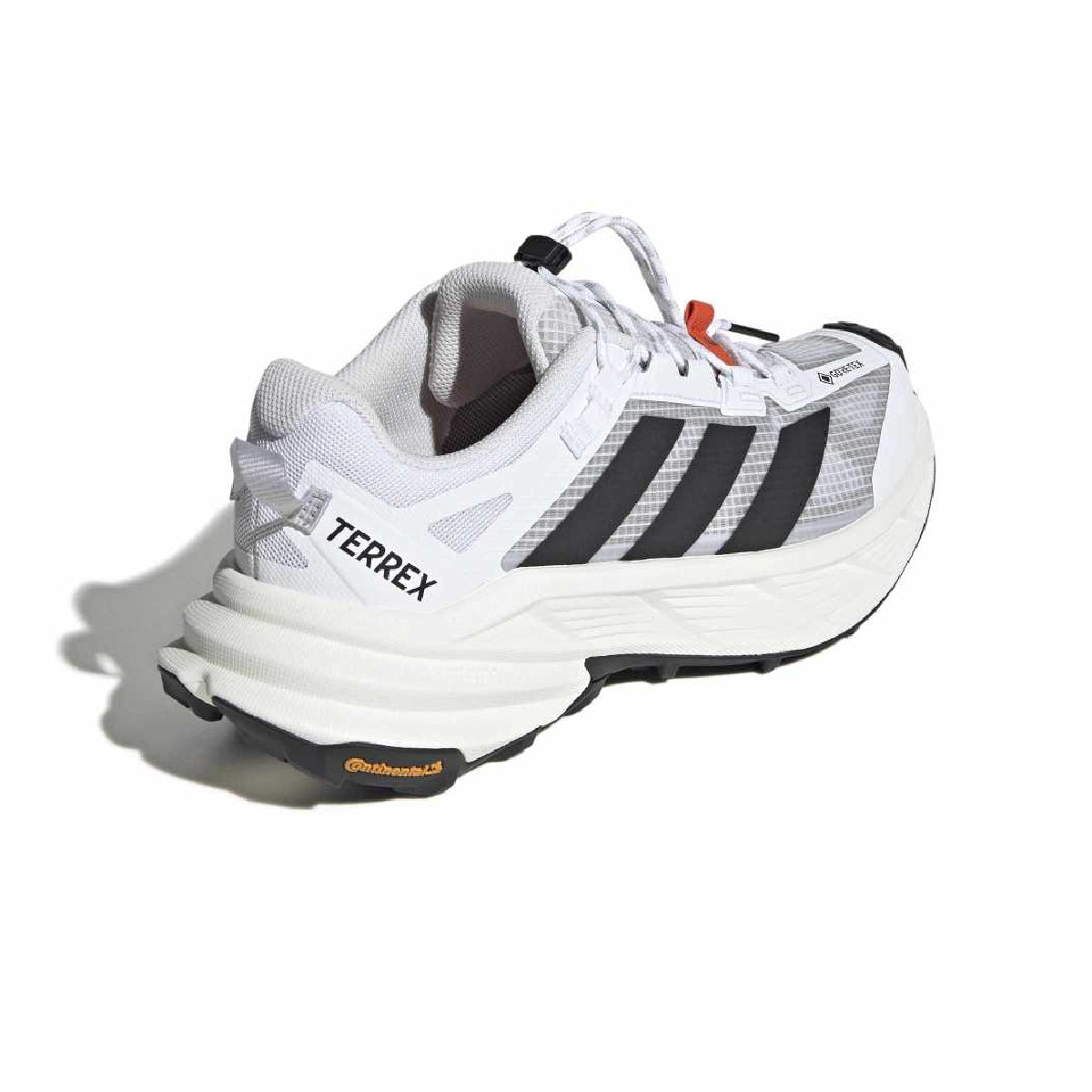 A white Adidas Terrex trail running shoe with black three-stripes, a white midsole, and a black outsole, shown on a white background with a soft shadow.