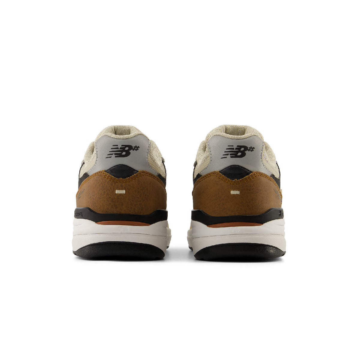A pair of New Balance sneakers shown from the back, featuring a brown suede heel counter, cream mesh collar, and a white and black midsole on a white background.