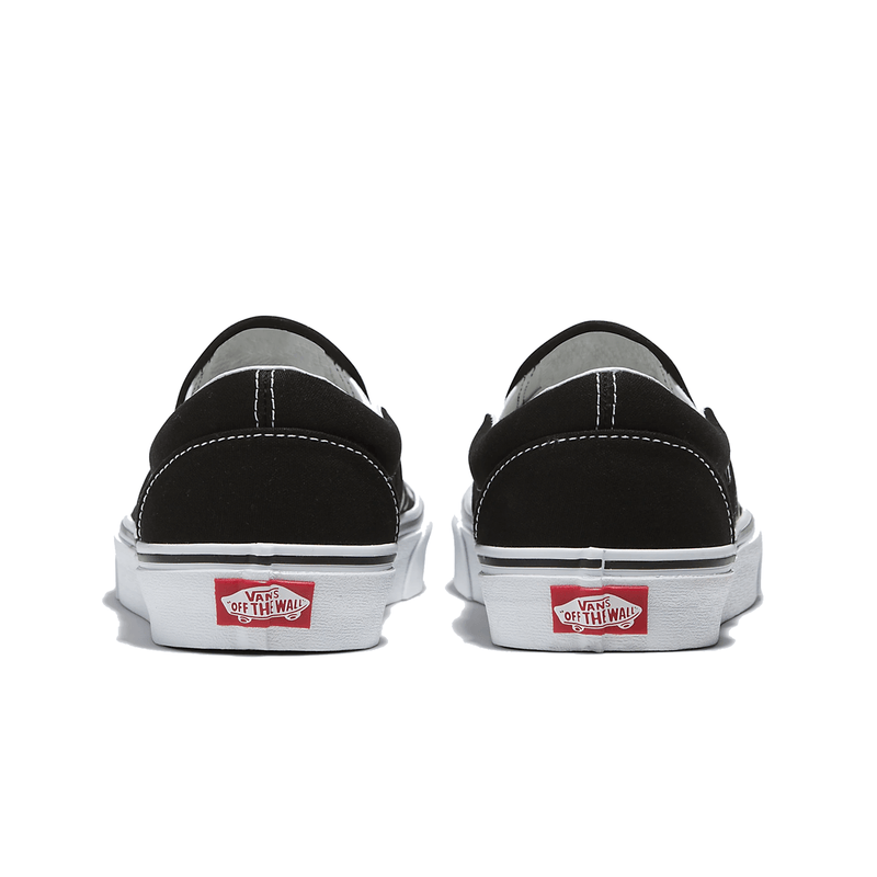 Vans classic slip on trainers black flame clearance wall