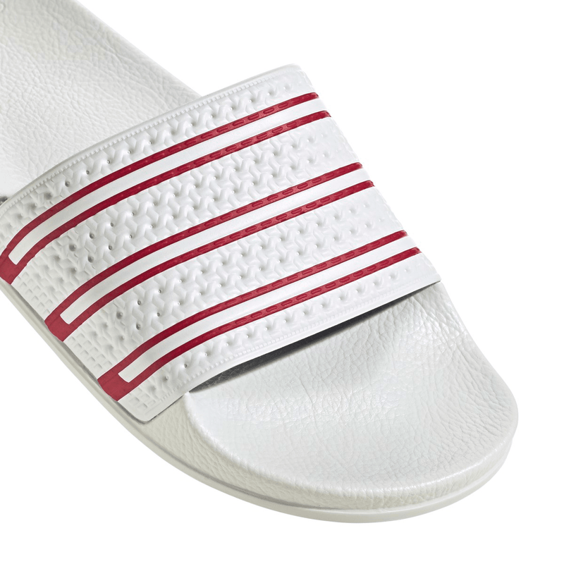 Red and 2025 white adidas slides