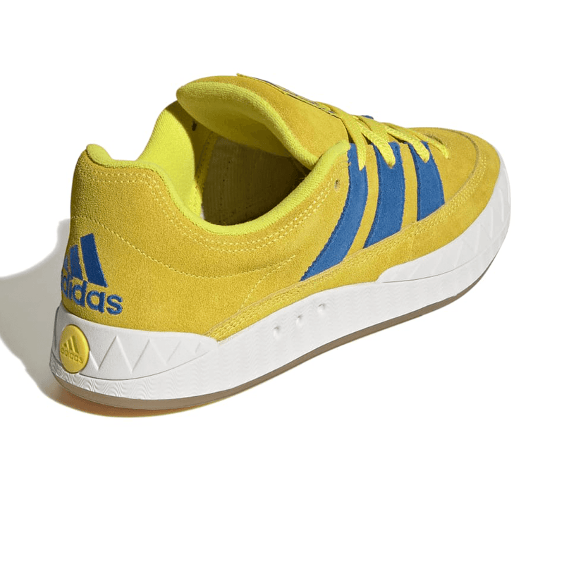 Bright yellow adidas shoes sales